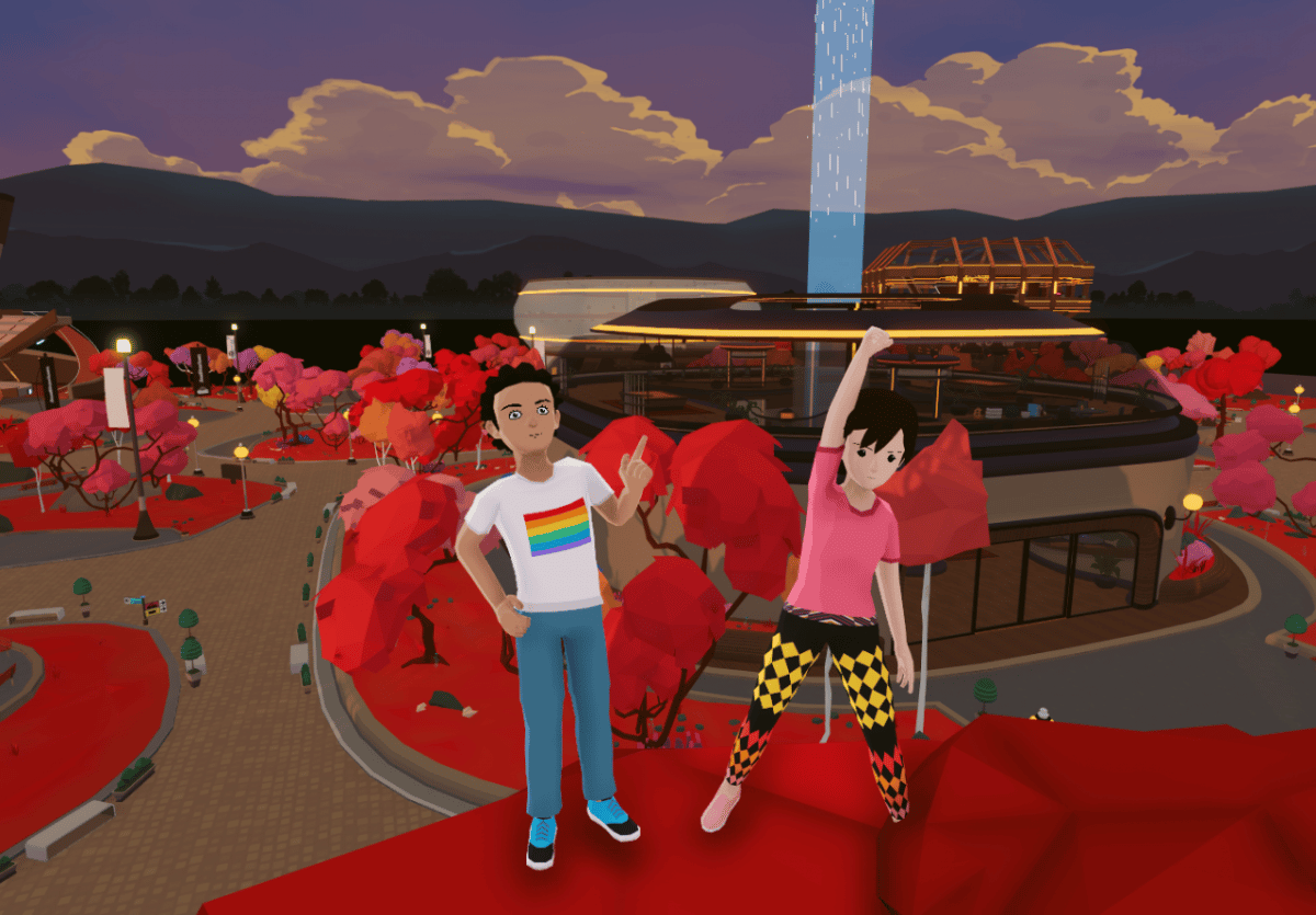 Dos avatares virtuales se paran frente a un estadio iluminado, en apoyo de la competencia Decentraland Ugly Sweater.